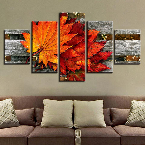 Maple Leaf In The Wooden Chair Canvas Wall Art